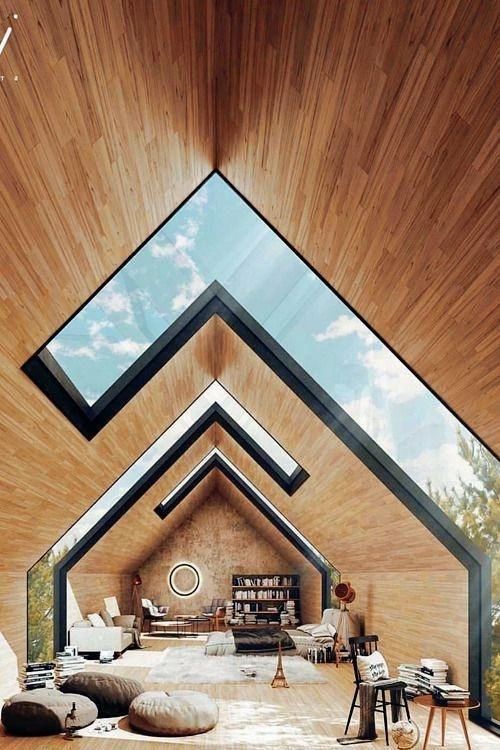 Design inspiration: an A-frame interior with triangular skylights and timber lining