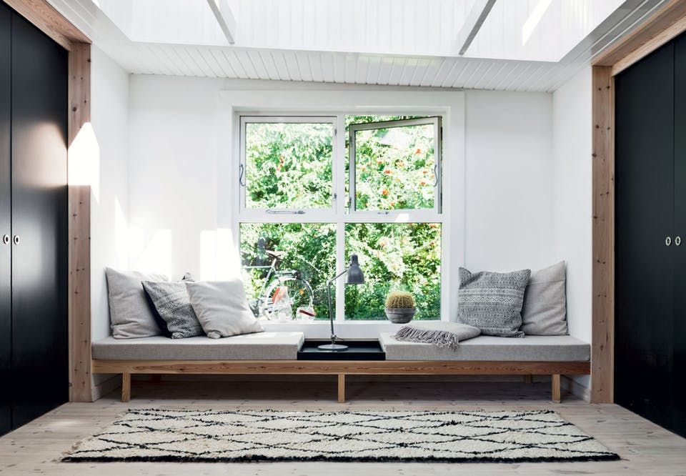 Design inspiration: a window seat opening onto a leafy garden